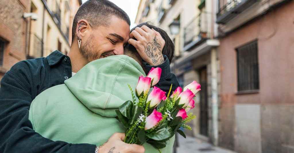 A couple hugging after saying I love you