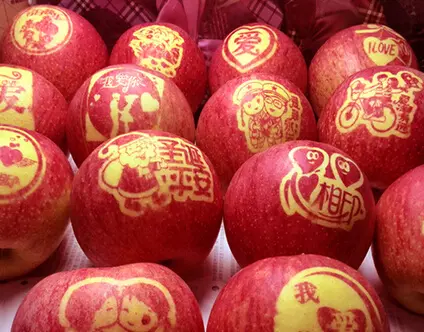 Apples with peace labelled