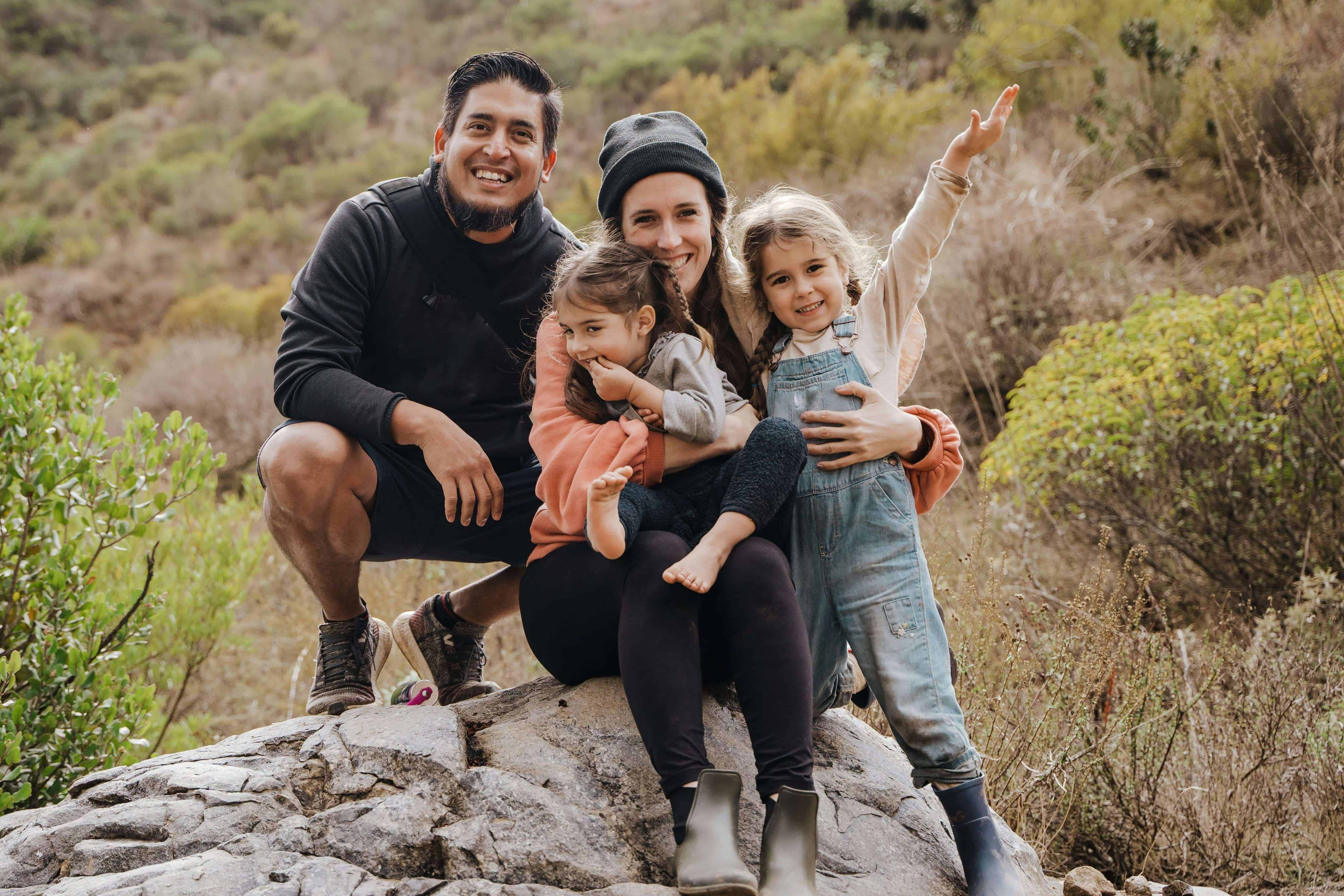 family climbing mountain