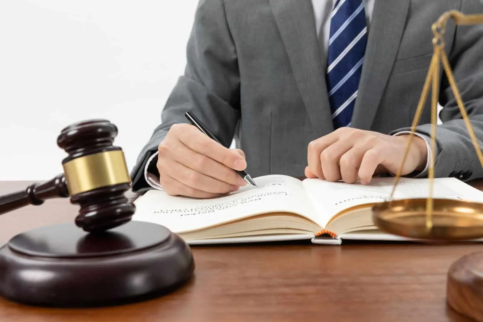 lawyer signing legal document