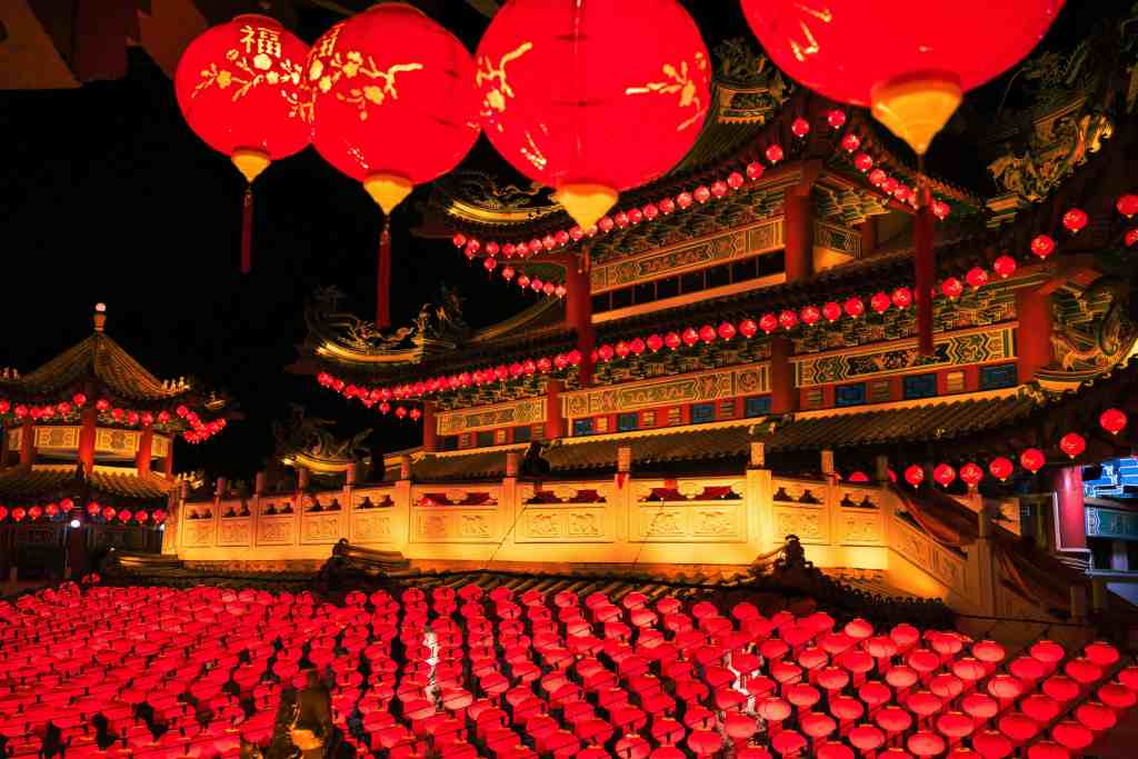 Stunning display of red lanterns at a traditional Chinese festival during nighttime.