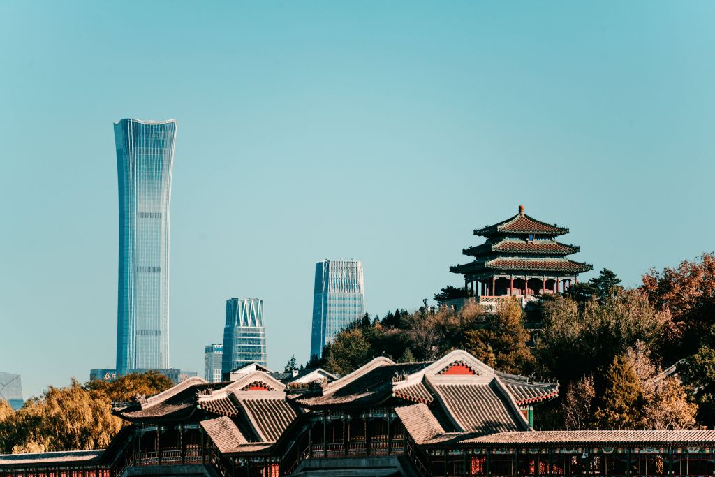 Traditional Beijing architecture and modern skyscrapers near the Central Academy of Fine Arts Beijing, showing how the city combines historic buildings, national museums, and modern creative districts for students studying art in China.