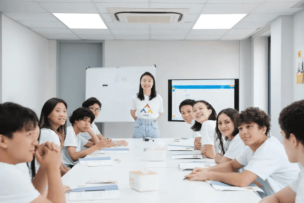 Teen students studying Mandarin in a classroom